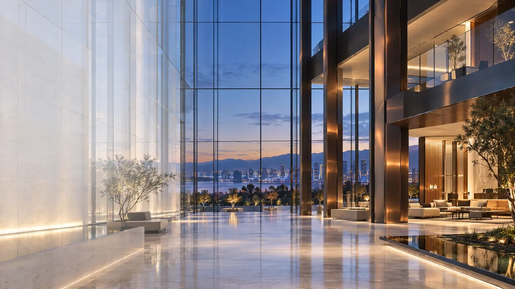 An expansive glass atrium with a clear view of the city beyond